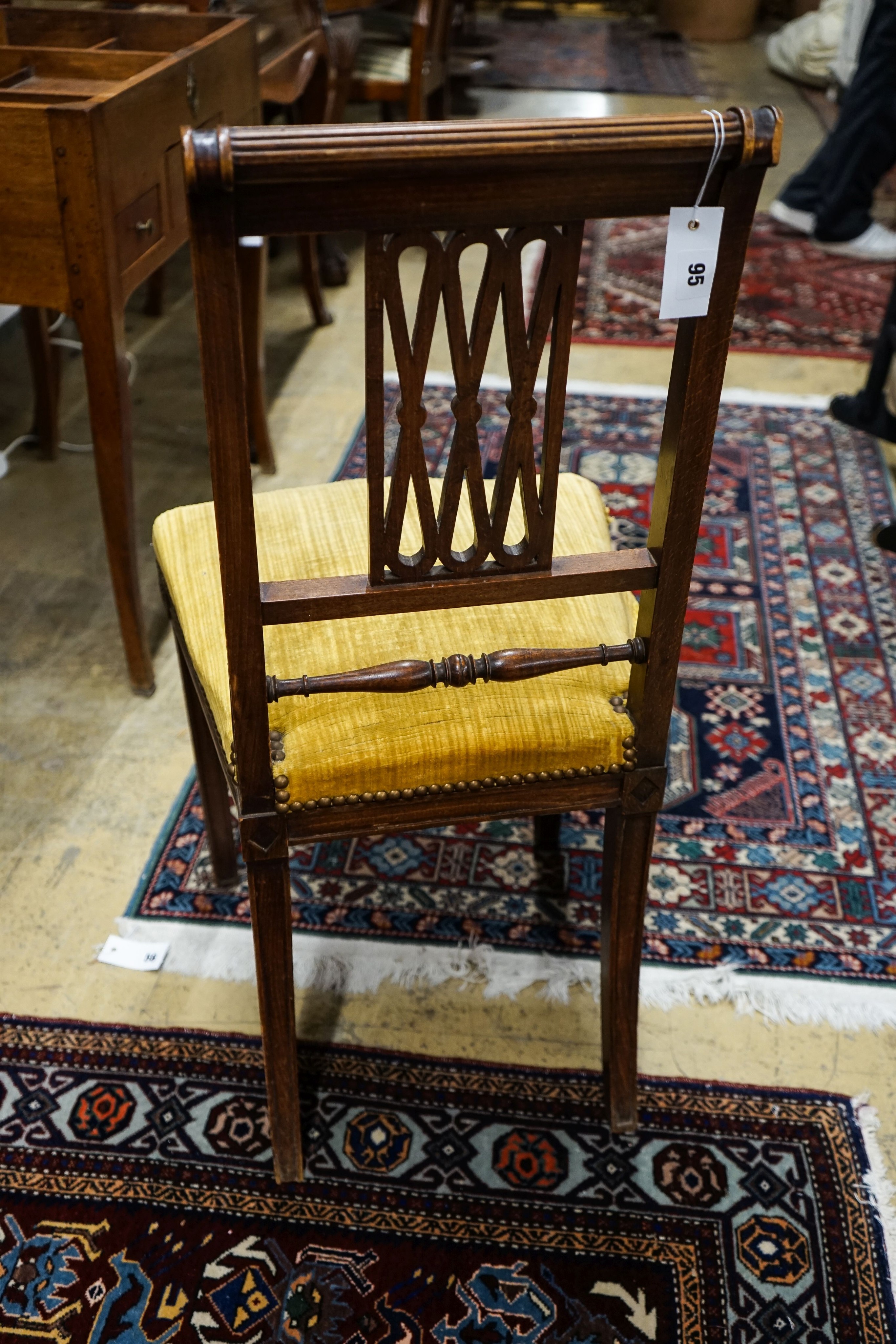 An Italian hall chair, with upholstered seat